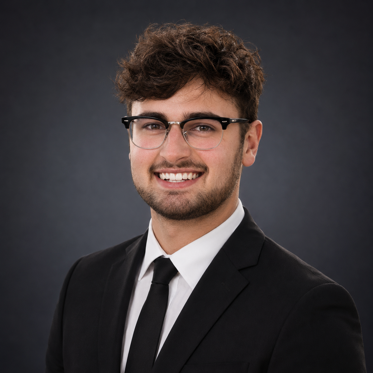 Professional headshot of Caden Holmquist